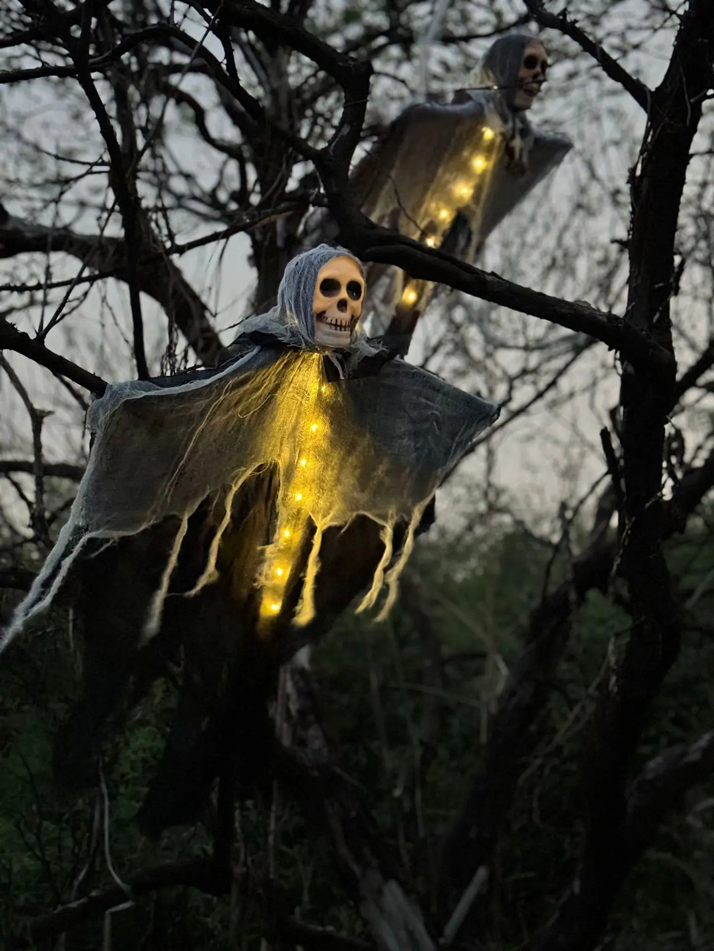 LED Glow Ghost Hanging Skull